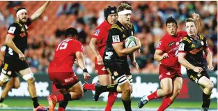  ??  ?? Not so super: Chiefs clash with the Sunwolves in Super Rugby yesterday