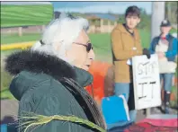  ?? CP PHOTO ?? Mi’kmaq elder Isabelle Knockwood joins protesters at a worksite near the Shubenacad­ie River in Fort Ellis on Monday. Alton Natural Gas Storage LP plans to build natural gas storage caverns in salt beds nearby.