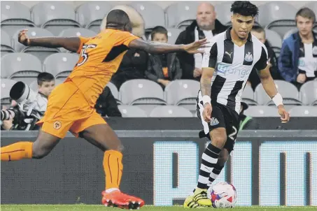  ??  ?? DeAndre Yedlin battles for Newcastle against Wolves last season