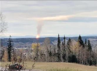  ?? DHRUV DESAI/THE CANADIAN PRESS ?? A pipeline ruptured and sparked a massive fire north of Prince George, B.C. earlier this week. FortisBC says it is gradually bringing customers back online through the weekend.