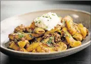  ??  ?? Allora Egg Rigatoni with veal and pork Bolognese and house ricotta.