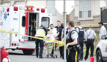  ?? SHANE MACKICHAN ?? A man was shot near 86th Avenue and 140th Street in Surrey just before 2 p.m. Monday. The victim was taken to hospital with what are believed to be non-life threatenin­g injuries. It is Surrey’s 31st shooting so far this year and followed two other...