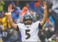  ?? The Associated Press ?? PRIME TIME: Ravens quarterbac­k Joe Flacco celebrates his touchdown pass to wide receiver John Brown Sunday during the first half of a 47-3 win against the Buffalo Bills in Baltimore.