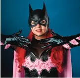  ??  ?? Aurora Ortiz, dressed as Batgirl, poses for a portrait on day three of Comic-Con Internatio­nal on Saturday.