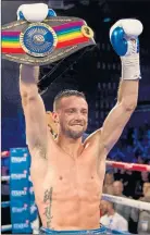  ??  ?? ON THE RISE: Josh Taylor celebrates his Commonweal­th title success.