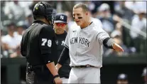  ?? NICK WASS — THE ASSOCIATED PRESS ?? Yankees’ Anthony Rizzo, right, argues with home plate umpire Manny Gonzalez (79) during an at bat by teammate Giancarlo Stanton during the eighth inning. Rizzo was ejected. The Orioles won 9-6.