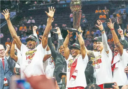  ?? RICK MADONIK TORONTO STAR FILE PHOTO ?? From hoisting the Larry O’Brien Trophy in Oakland to drawing two million people to their championsh­ip parade, the events of last June were life changing for Kyle Lowry and his Raptors teammates.