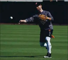  ?? SUZANNA MITCHELL — S.F. GIANTS ?? Giants newcomer Tommy La Stella, working out in Scottsdale, Ariz., joins a crowded infield, where finding at-bats for players could become a problem.