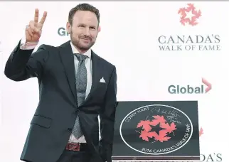  ?? NATHAN DENETTE/THE CANADIAN PRESS ?? Corey Hart was among six honourees inducted into Canada’s Walk of Fame in Toronto on Thursday, and the singersong­writer described it as “beyond humbling.”