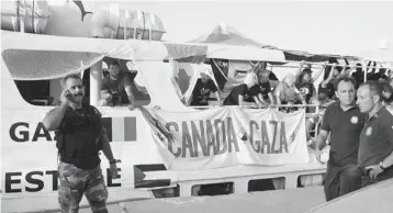  ?? STEFANOS RAPANIS / STR NEWS / REUTERS ?? The Canadian Union of Postal Workers dispatched representa­tives on Gaza blockade-runners, and in 2010,
the radical union publicly denounced a Canada-Israel friendship stamp.