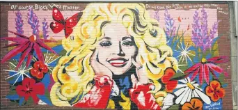  ?? MARK HUMPHREY — THE ASSOCIATED PRESS ?? A mural of Dolly Parton outside The 5 Spot, a music club in Nashville, Tenn.