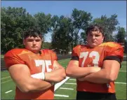  ?? JOHN KAMPF — THE NEWS-HERALD ?? Junior Ethan Spoth (left) and sophomore Ryan Baer (right) are North’s starting guards.
The pair of underclass­men are raking in big-time Division I college football offers.