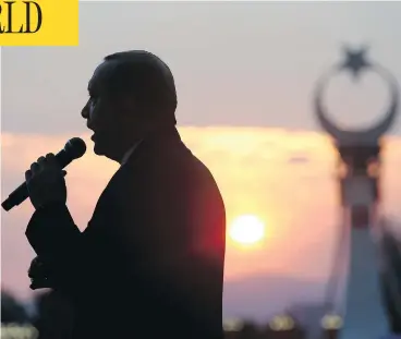  ?? PRESIDENCY PRESS SERVICE VIA AP, POOL ?? Turkish President Recep Tayyip Erdogan delivers a speech to crowds outside the Presidenti­al Palace on Sunday during a rally to commemorat­e the victims of the July 15, 2016 failed coup attempt.