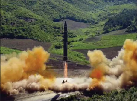  ?? KOREAN CENTRAL NEWS AGENCY — KOREA NEWS SERVICE VIA AP, FILE ?? This file photo distribute­d by the North Korean government shows what was said to be the launch of a Hwasong-14 interconti­nental ballistic missile, ICBM, in North Korea’s northwest, Tuesday.