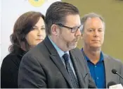  ?? JOE CAVARETTA/SOUTH FLORIDA SUN SENTINEL ?? Sunrise Mayor Mike Ryan, pictured with Parkland Mayor Christine Hunschofsk­y and Broward County Mayor Beam Furr, speaks about the new report.