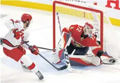  ?? AFP ?? The Panthers’ Sergei Bobrovsky, right, makes a save against the Hurricanes.