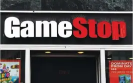  ?? MICHAEL M. SANTIAGO/GETTY IMAGES/TNS ?? GameStop is aggressive­ly expanding its warehouse distributi­on network as the company aims to transform itself into a serious e-commerce retailer.