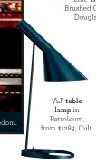  ??  ?? ‘AJ’ table lamp in Petroleum, from $1283, Cult.