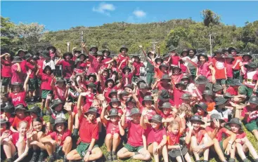  ??  ?? MEMORIAL: Holy Cross School students wear red and raise money for the Morcombe Foundation.