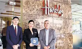  ?? CONTRIBUTE­D FOTO ?? VERY GOOD. From left, Front Office manager Jansen Quinones, Senior Sales Account manager Shalimar Panilag, and general manager Ed Tongco present Booking.com’s 8.7 rating. They said the high rating got them more guest bookings. 2019 The target...