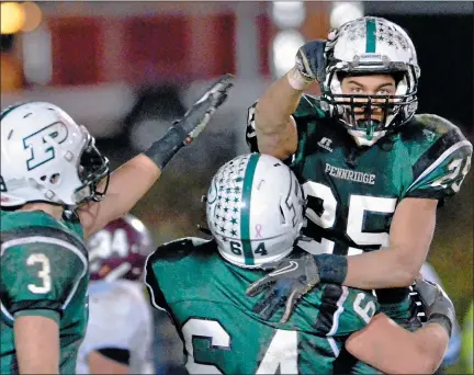  ?? MARK C PSORAS — MEDIANEWS GROUP FILE ?? Pennridge’s Mike Class (25) is hoisted by teammate Cory Blazer (64) after his third touchdown against Abington in the fourth quarter of the Rams’ District 1-4A first round contest at Poppy Yoder Field on Friday, Nov. 9, 2012.