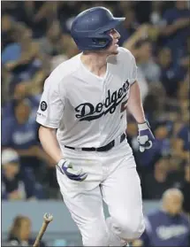  ?? Chris Carlson Associated Press ?? COREY SEAGER doubles in L.A.’s first two runs in the fifth, and his two-run double in the seventh gave L.A. the lead for good.