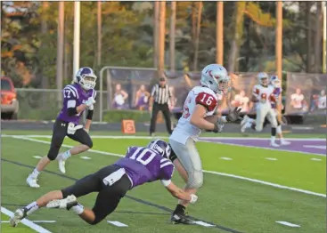  ?? Robbie Bills/Times-Courier ?? Dalton Bowman tries to struggle away from the Gilmer County defense toward a touchdown during their game on the road against the Bobcats.