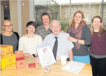  ??  ?? Team effort Boyd Tunnock, centre, launched the match-funding challenge with Maggie’s staff and visitors