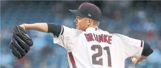  ?? ROSS D. FRANKLIN THE ASSOCIATED PRESS ?? Six-time all-star pitcher Zack Greinke was the biggest name to move at the MLB trade deadline on Wednesday, going to the AL West-leading Houston Astros.