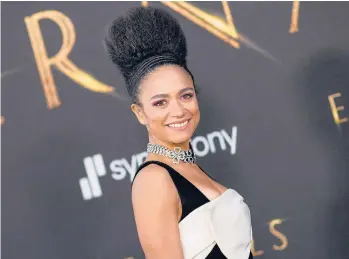  ?? VALERIE MACON/GETTY-AFP ?? Actor Lauren Ridloff arrives for the Oct. 18 premiere of Marvel Studios’“Eternals” in Los Angeles. In the film, Ridloff plays Makkari, a cosmic being known for her superhuman speed who is also the franchise’s first deaf superhero.