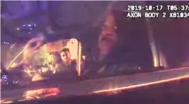  ?? CPD ?? This image taken from police bodycam video shows officers speaking with then-Supt. Eddie Johnson after they found him asleep behind the wheel of his police SUV.