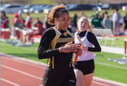  ?? BARRY BOOHER — FOR THE NEWS-HERALD ?? Beachwood’s Sarah Brown finishes off a 4x200win April 2during Harvey’s Red Raider Relays.