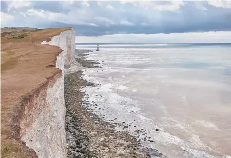  ?? ANDY HASLAM/THE NEW YORK TIMES 2017 ?? As vaccinatio­n becomes a reality, it’s time to start nurturing your imaginatio­n on where to travel next. Above, the coastal cliffs of South Downs, England.