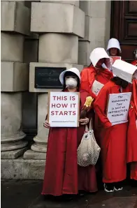  ??  ?? “It’s a warning, not a blueprint”: handmaid imagery as a shorthand for women’s protest