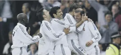  ??  ?? 0 Real Madrid midfielder Zinedine Zidane celebrates his famous Champions League-winning goal in 2002