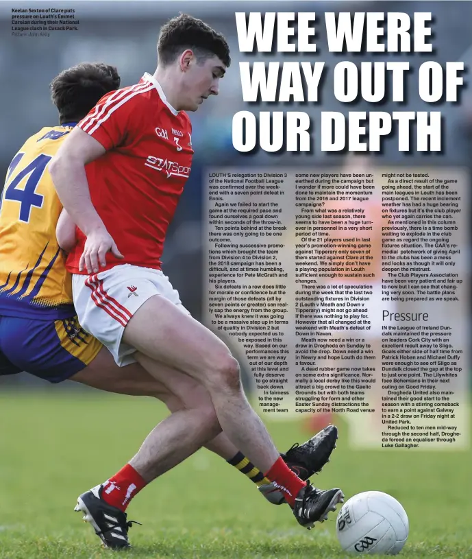  ??  ?? Keelan Sexton of Clare puts pressure on Louth’s Emmet Carolan during their National League clash in Cusack Park. Picture: John Kelly