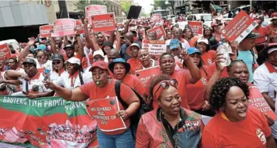  ?? / VELI NHLAPO ?? Thousands of public sector workers painted Pretoria red yesterday. They're demanding a 10% salary increase.