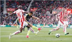  ?? — Reuters file picture ?? Arsenal’s Alexis Sanchez scores.