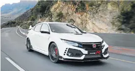  ??  ?? The latest Honda Civic Type-R is brash in appearance but it has the performanc­e to match it.