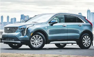  ??  ?? The Cadillac XT4 comes with a 237-horsepower 2.0-litre four-cylinder, but the upcoming V-Sport model will get a 2.7-litre truck engine that makes 310 horsepower in the Chevrolet Silverado.