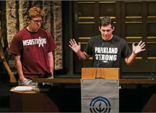  ?? RICH SCHULTZ / ASSOCIATED PRESS ?? Harris Jaffe (right), a student who survived the Marjory Stoneman Douglas High School shooting, addresses a community rally for common sense gun legislatio­n Sunday at Temple B’nai Abraham in Livingston, N.J. Matthew Deitsch (left), another survivor,...