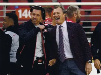  ?? JOSE CARLOS FAJARDO — STAFF PHOTOGRAPH­ER ?? Niners general manager John Lynch, right, and head coach Kyle Shanahan have formed a powerful leadership team that got a boost with Lynch agreeing to a contract extension through 2024 on Wednesday.