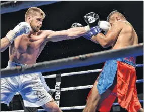  ?? PHOTO BY ADAM MACINNIS ?? Pictou County’s own Brody Blair faced Juan Raygosa at the Pictou County Wellness Centre on April 21. Blair strategica­lly fought his way to claim his third profession­al win in front of a home crowd.