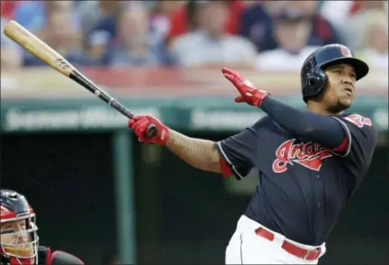  ?? TONY DEJAK — THE ASSOCIATED PRESS ?? Jose Ramirez watches his three-run home run off Reds reliever Tanner Rainey in the third inning on July 11 at Progressiv­e Field.