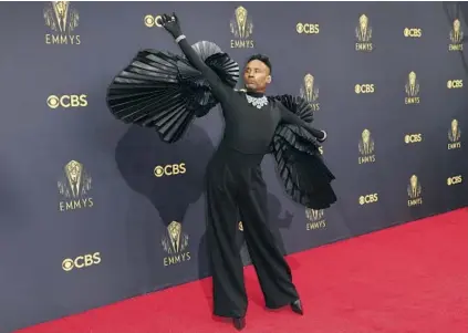  ??  ?? ▲ billy porter in ashi studio Porter can unfurl his fabric wingspan on the red carpet like nobody’s business. Fun fact: The black pleated number he’s wearing could make about 7,000 copies of the floral neck knot Josh O’Connor wore at the same event.