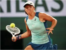  ?? Getty ?? Iga Swiatek eased into the second round of the French Open after beating Lesia Tsurenko 6-2, 6-0