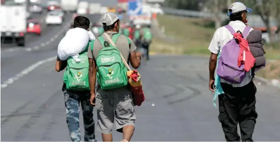  ?? AGENCIA ENFOQUE ?? Los migrantes recibieron atención médica, así como refugio en su paso por la capital poblana.