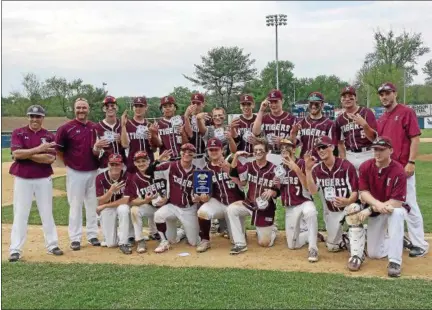  ?? BRIAN HUBERT — DAILY FREEMAN ?? Kingston players and coaches celebrate after defeating Warwick to win their third straight Section 9, Class AA title Saturday at Cantine Field.