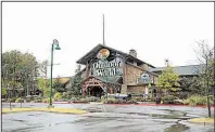  ?? Arkansas Democrat-Gazette/STATON BREIDENTHA­L ?? A Connecticu­t-based limited liability company recently paid $21.9 million to buy the Bass Pro Outdoor World retail store and almost 15 adjacent acres at the Gateway Town Center.