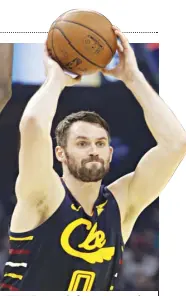  ?? AP ?? KEVIN LOVE receives the first Humanitari­an of the Year Award on Thursday night at the Greater Cleveland Sports Awards.